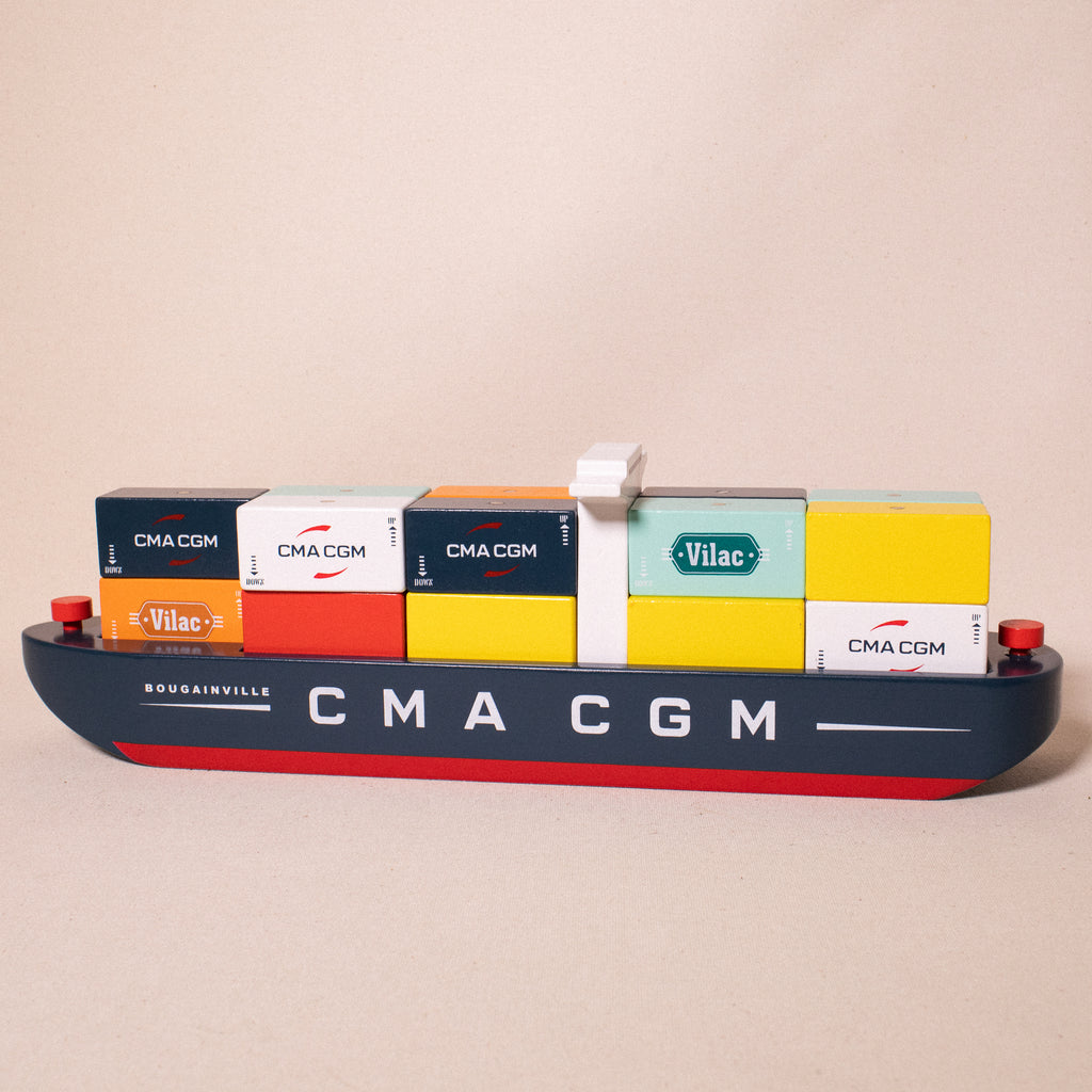 wooden container ship with 16 containers on board