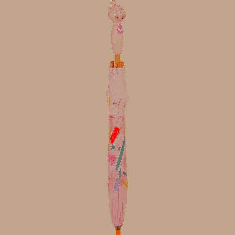 umbrella with flower design and doll handle