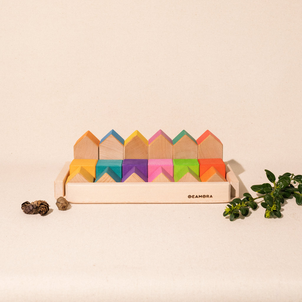 set of 18 houses and cubes of various colours by Ocamora in wooden box