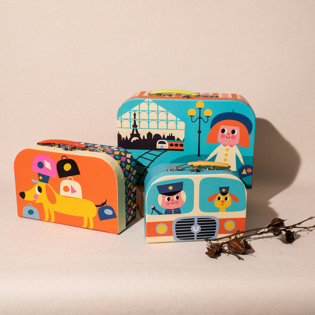 set of 3 suitcases featuring art of Ingela P Arrenhius