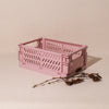 pink folding storage crate