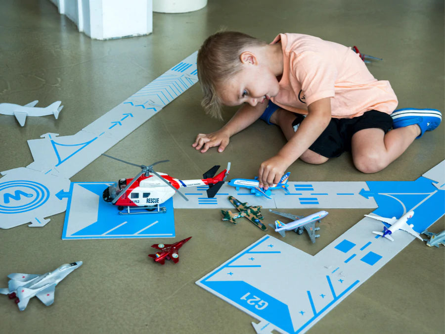 child playing with planes and helicopter or waytoplay runway 