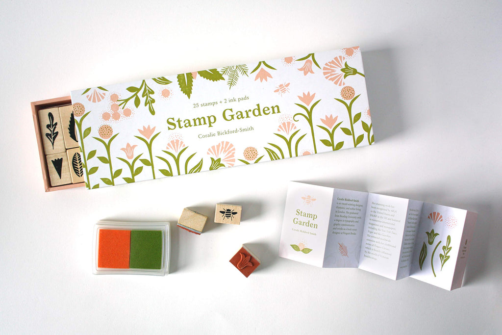 stamp garden open bbox showing green and orange stamp pad, multiple wooden stamps and a booklet